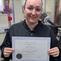 Student receives her Platinum Certificate at Dog Grooming Course Bromsgrove