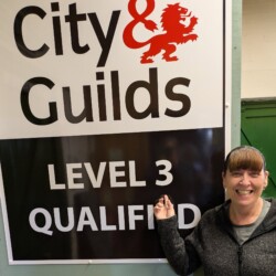 Student achieving her Level 3 Dog Grooming Diploma after course in Stratford upon Avon