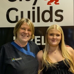 Student acheiving her City and Guilds Level 2 at her dog grooming course Evesham