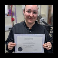 Student receives her Platinum Certificate at Dog Grooming Course Bromsgrove